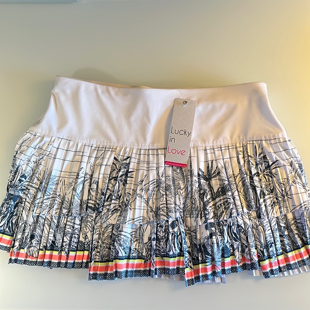 New lucky in love tennis skirt, white blue with some orange and yellow trim.